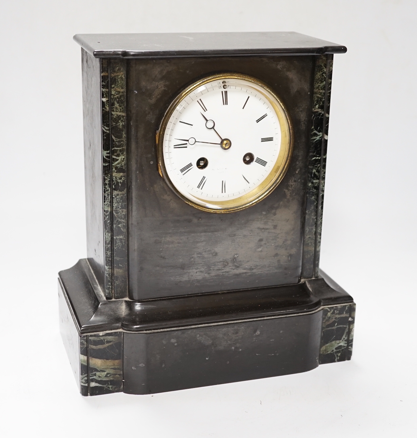 A black slate and marble mantle clock, 6.5cm high